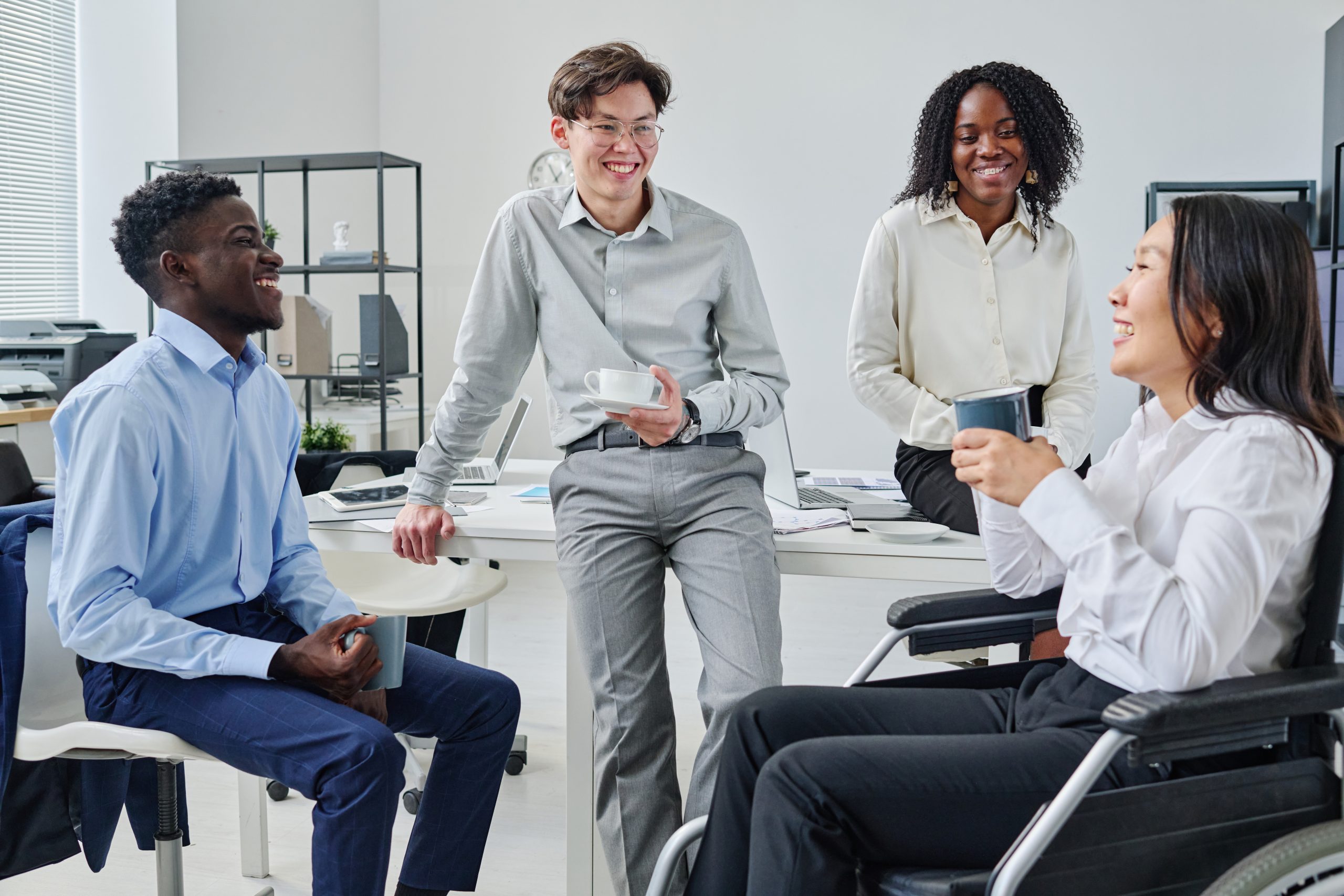 Emotional Intelligence and Empathy in the Workplace colleagues having coffee break at office
